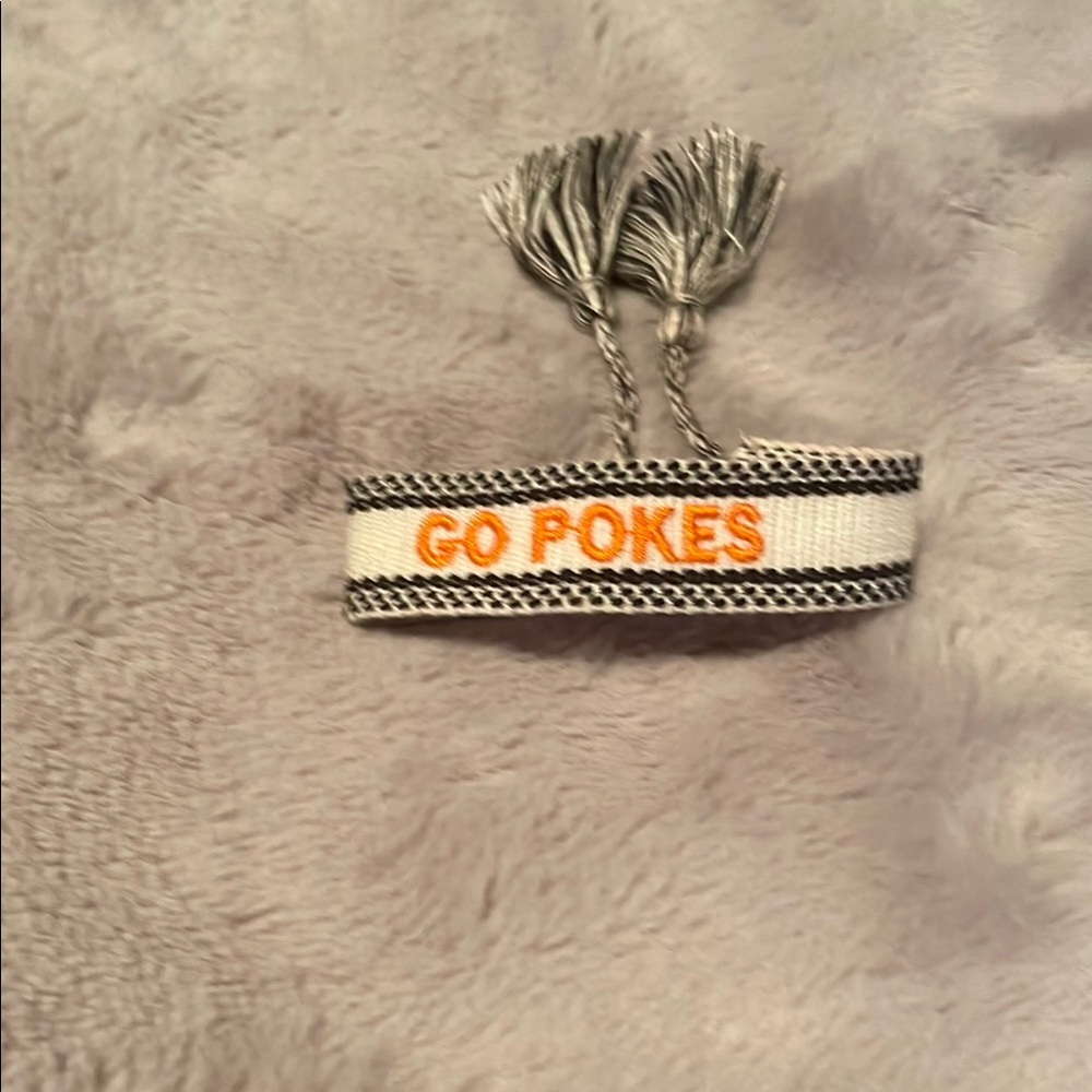 Gray and White Bracelet with Orange Text